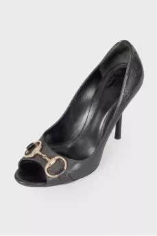 Shoes with embossed brand logo