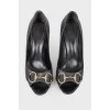 Shoes with embossed brand logo