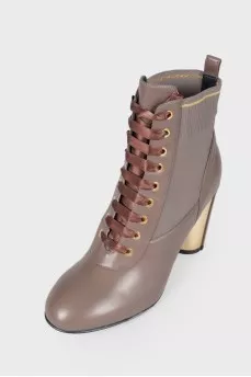 Leather ankle boots with tag
