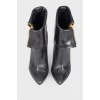 High-heeled leather ankle boots