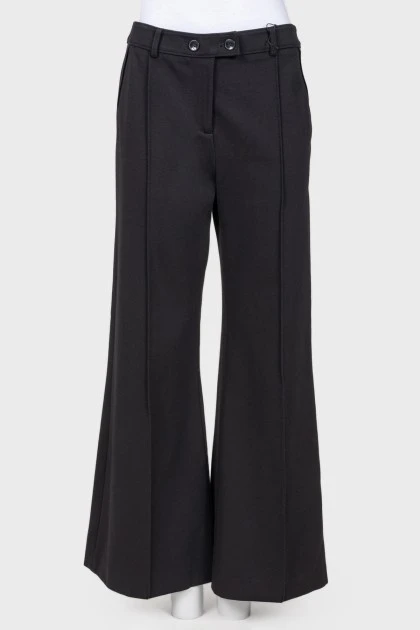 Flared trousers with arrows