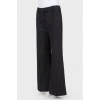 Flared trousers with arrows