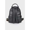 Backpack with an applique of rhinestones