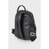 Backpack with an applique of rhinestones