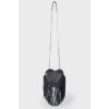 Bag in the form of a heart, with fringe