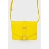 Bright yellow bag on the shoulder belt