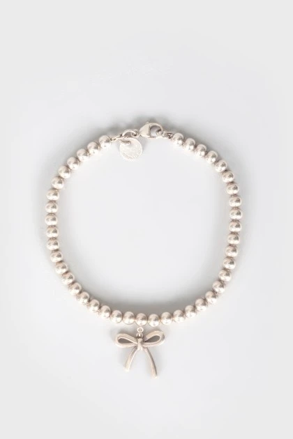 Bracelet with a suspension