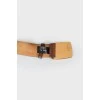 Leather belt with massive buckle