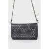 Leather bag with metal chain