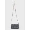 Leather bag with metal chain