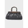 Leather bag with wooden handles