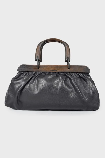 Leather bag with wooden handles
