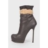 High-heeled leather ankle boots