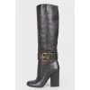 Leather boots with a strap