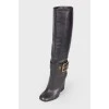Leather boots with a strap
