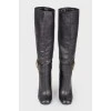 Leather boots with a strap