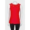Red top with a lace collar