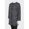 Black coat in polka dots