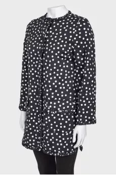 Black coat in polka dots