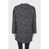 Black coat in polka dots