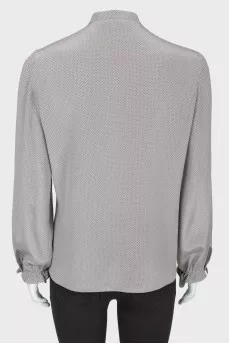 Blouse with small polka dots with ruffles