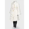 Down jacket with golden buttons